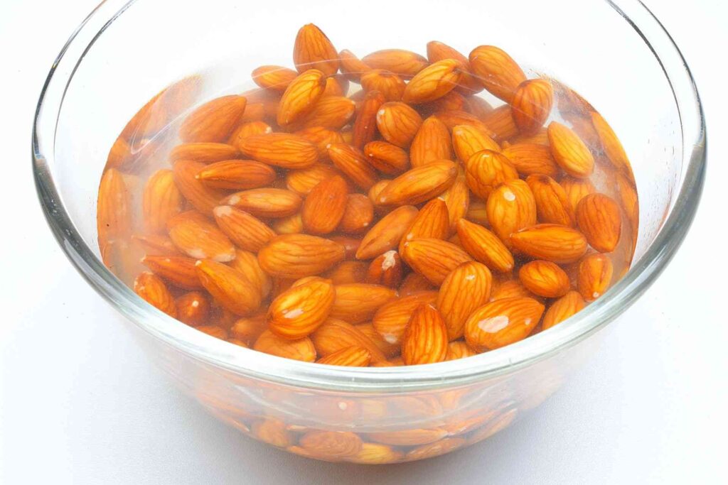 soaked almonds in a bowl of  water