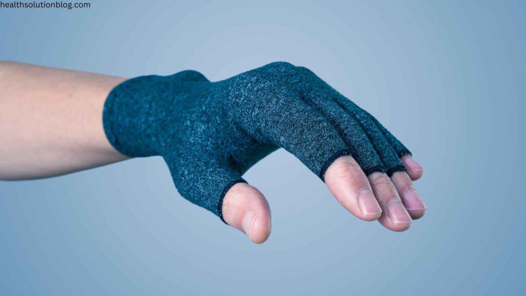 A hand with fingerless compression gloves for neuropathy