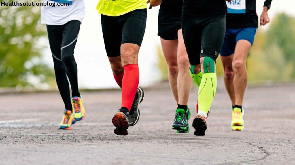 Men jogging with different colors wore compression bamboo socks