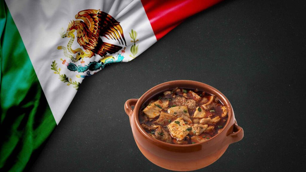 A bowl of menudo with mexican flag 