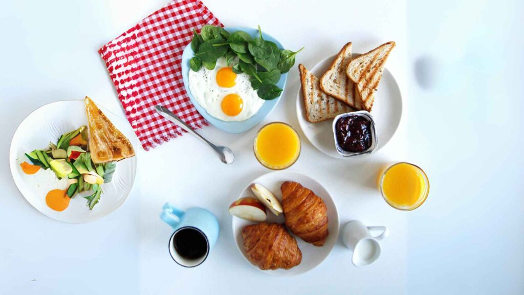 different breakfast foods on table