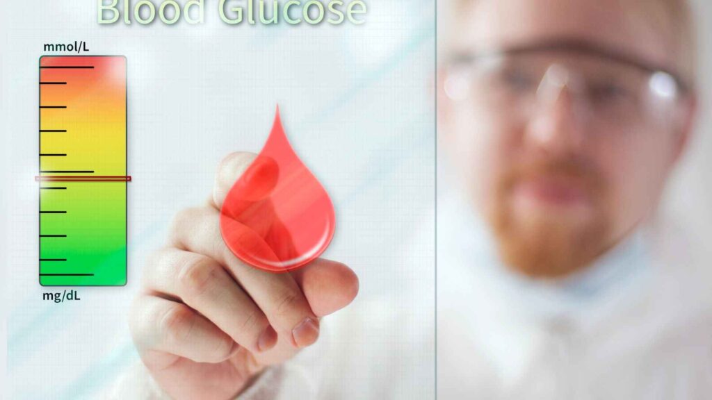 A doctor pointing to blood drop on glass screen